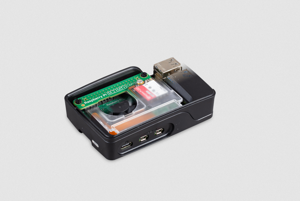 The Raspberry Pi M.2 HAT+ Compact inside the official Raspberry Pi 5 case